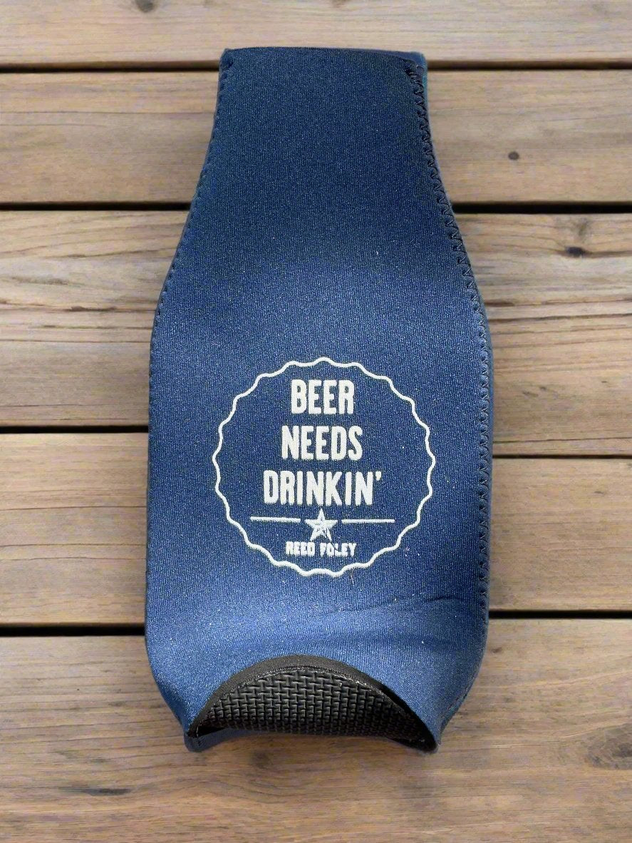 Beer Needs Drinkin’ Bottle Koozie